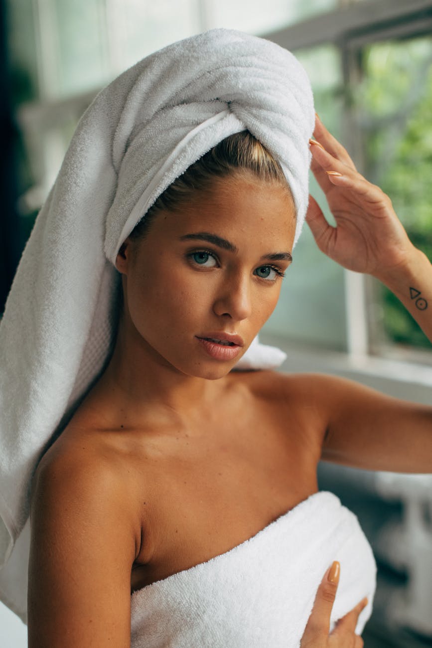 woman covered with white towel